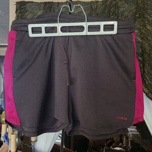 J29  Reebok running Shorts w/Purple Side Panels  Sz L